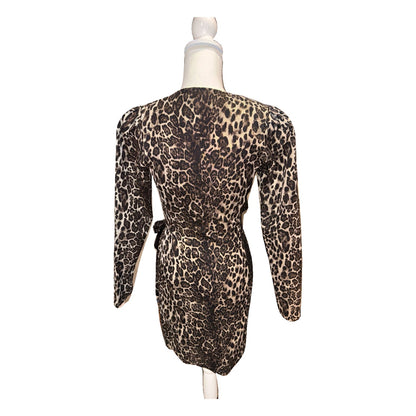 Back of the Essentiel Antwerp leopard-print dress with long sleeves and fitted waist.