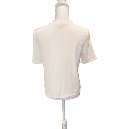 Back of the ivory MILLY T-shirt with short sleeves, round neckline and straight hem.