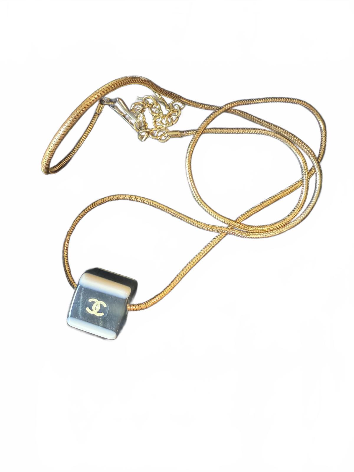 Chanel Gold Tone Necklace with Black Cube Pendant