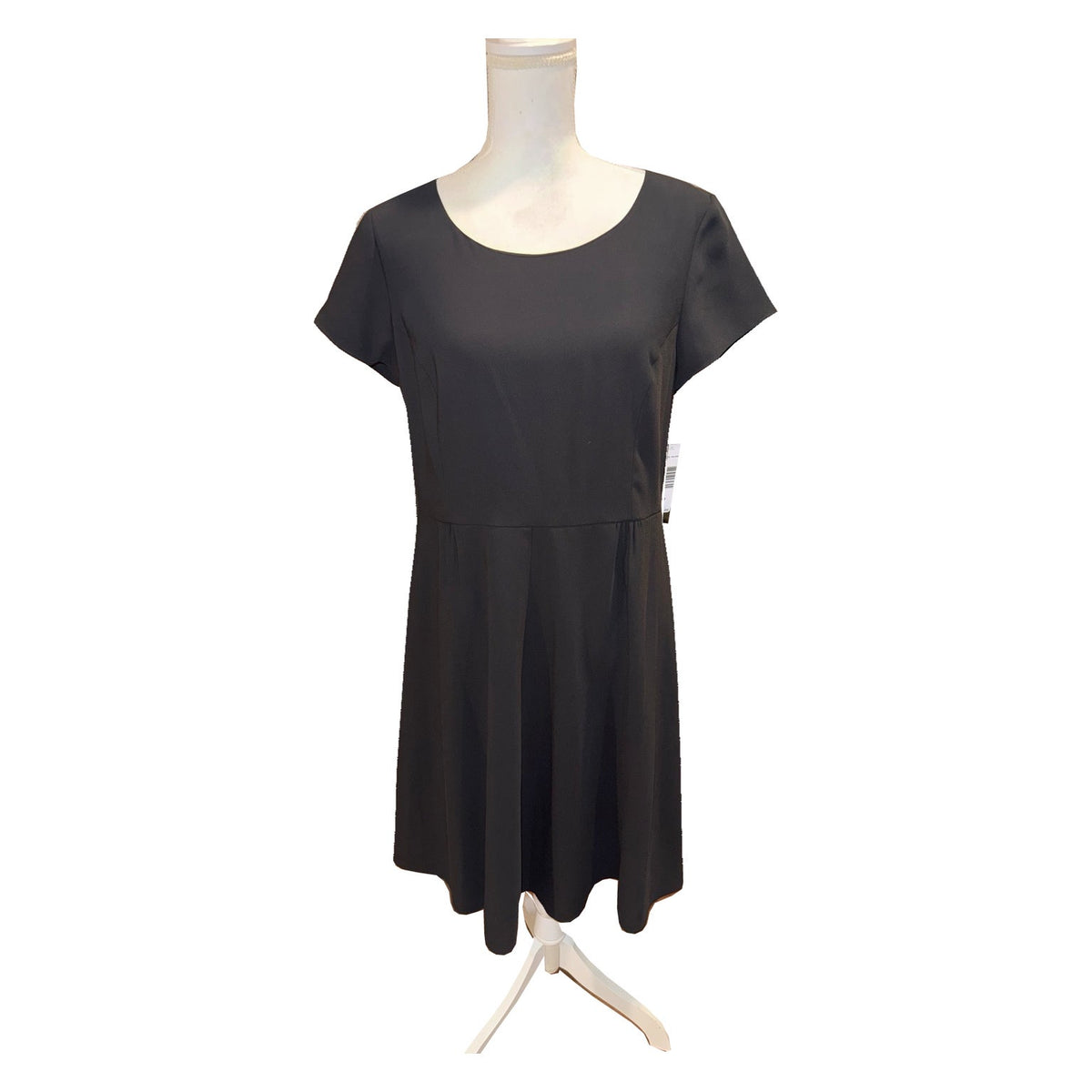 Front of the black Pendleton fit-and-flare dress with scoop neck, short sleeves and pleated skirt.