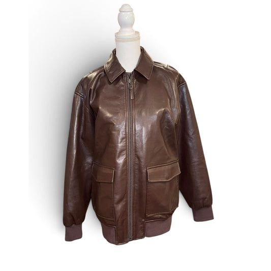 Anine Bing Kelanie brown leather jacket with pointed collar, front patch pockets, zip fastening and ribbed trim