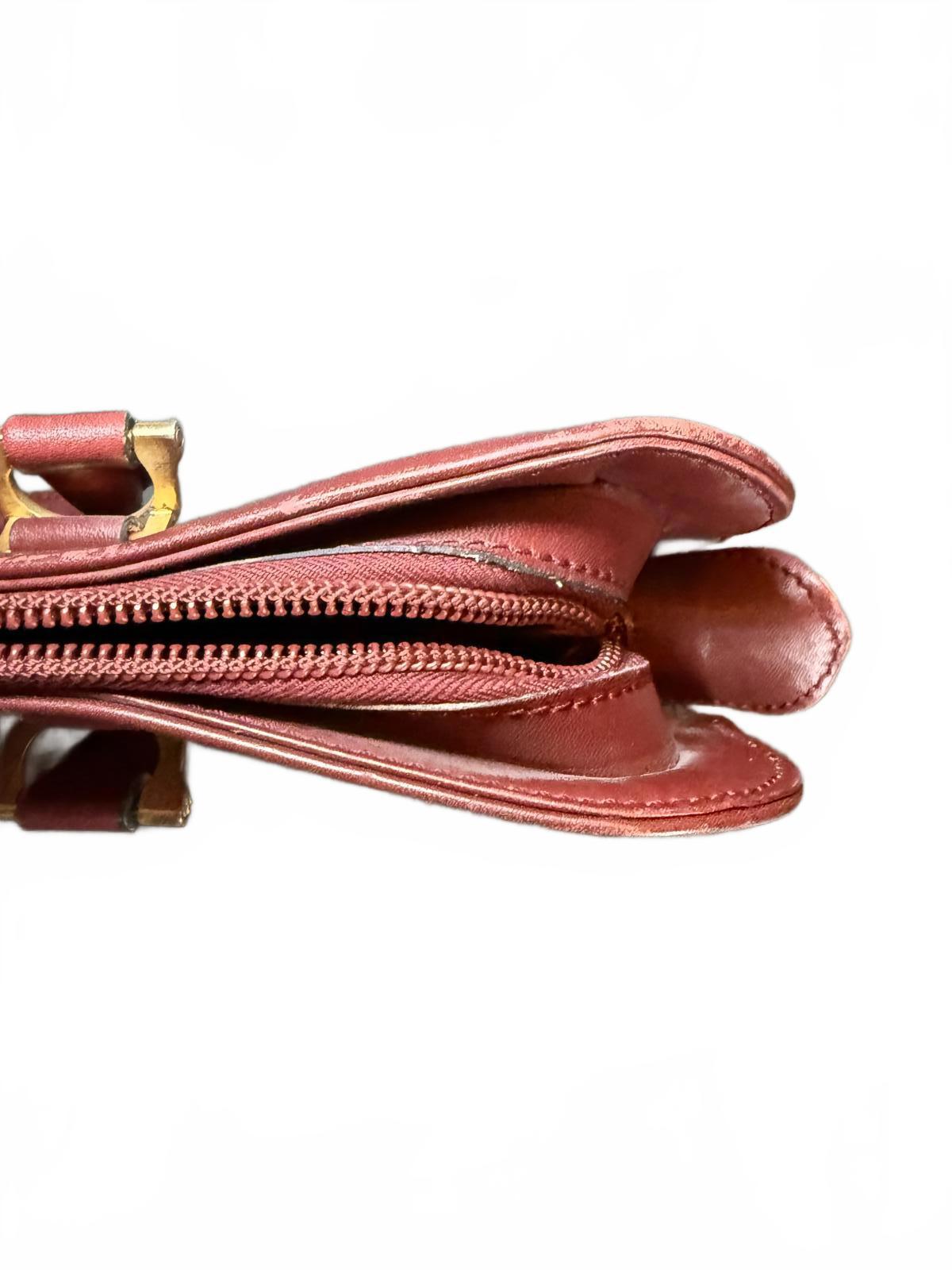 Cartier a Must De Cartier Bordeaux leather briefcase.