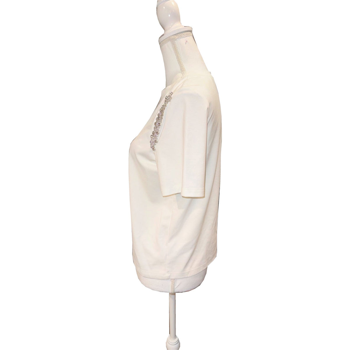 Side view of the ivory MILLY T-shirt, showing short sleeve and the sparkling shoulder detail.