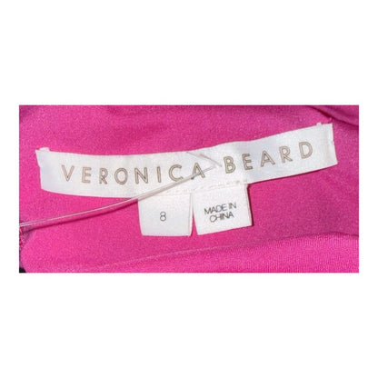 Veronica Beard brand label with size 8 and Made in China tags inside the fuchsia dress.