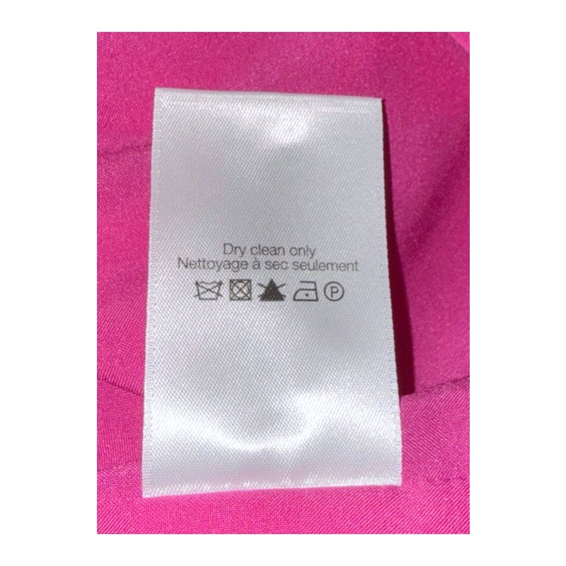 Dry-clean-only care label inside the fuchsia Veronica Beard Ruthie dress.