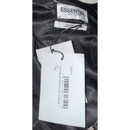 Essentiel Antwerp brand label and attached Troubles Draped Minidress hangtag inside the dress.