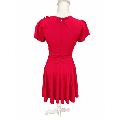 Back of the RED Valentino dress, showing the center zipper, defined waistband and flared skirt.