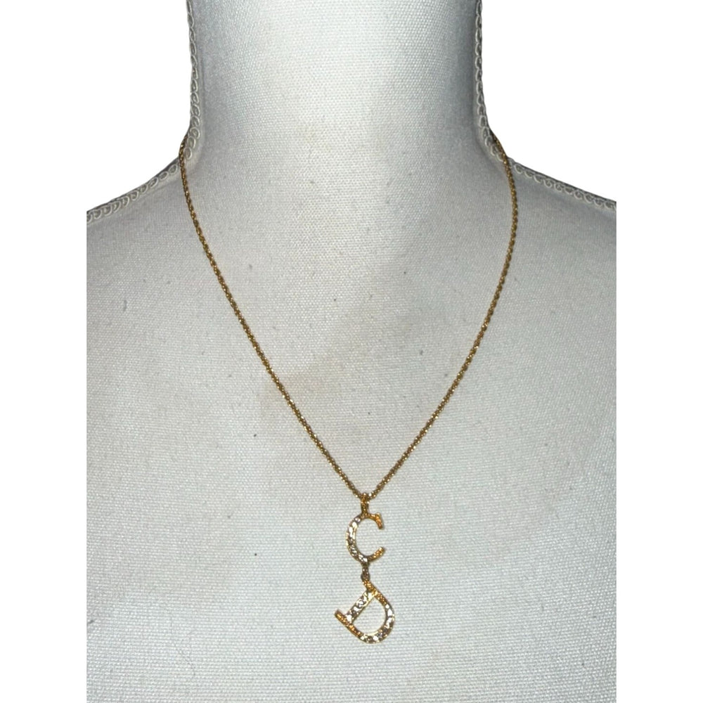Front view: Christian Dior Gold-Tone CD Pendant Necklace With Chain