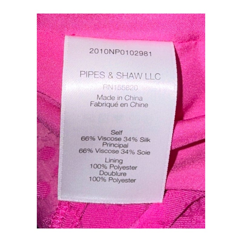 Veronica Beard fabric label: 66% viscose, 34% silk shell and 100% polyester lining; made in China.