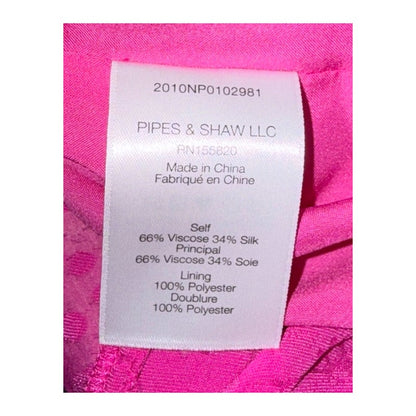 Veronica Beard fabric label: 66% viscose, 34% silk shell and 100% polyester lining; made in China.