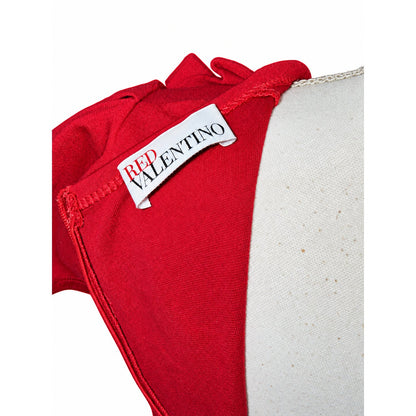 RED Valentino brand label inside the reddish-pink dress near the zipper.