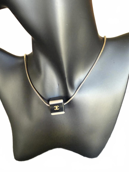 Chanel Gold Tone Necklace with Black Cube Pendant