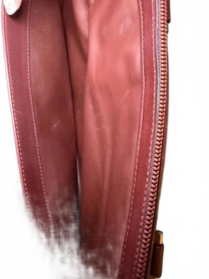 Cartier a Must De Cartier Bordeaux leather briefcase.