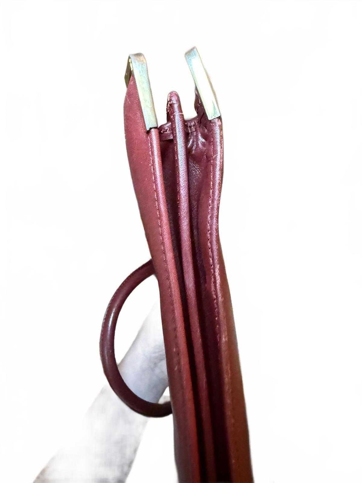 Cartier a Must De Cartier Bordeaux leather briefcase.