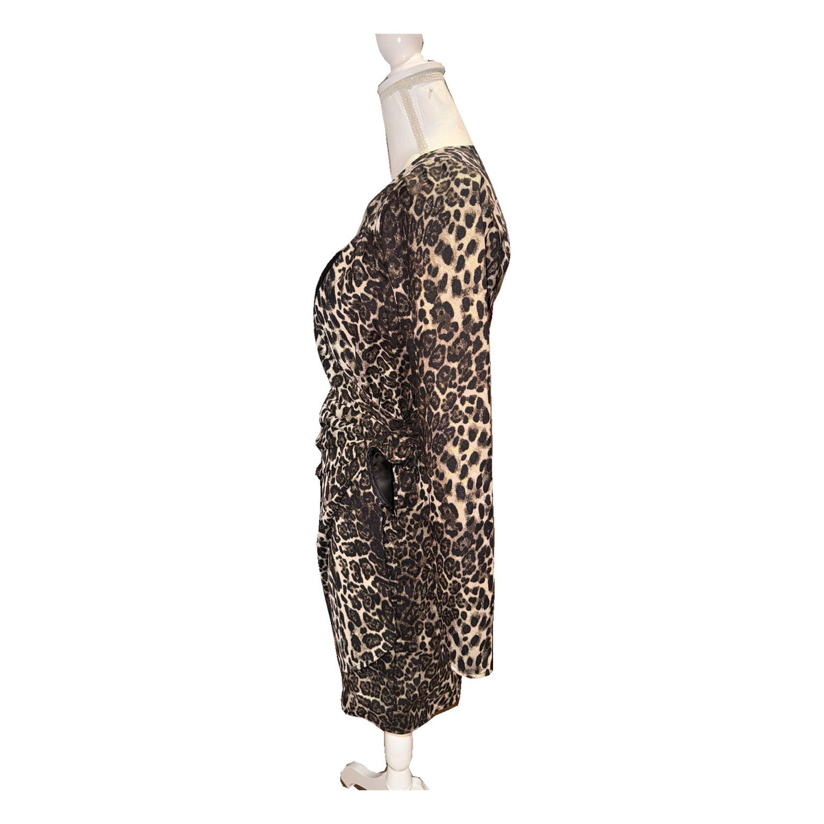 Side view of the Essentiel Antwerp leopard dress, showing gathered waist and wrap-effect skirt.