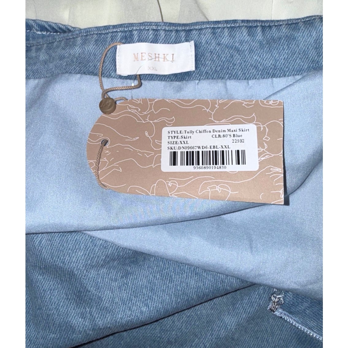 MESHKI label and hangtag identifying Tully Chiffon Denim Maxi Skirt, size XXL, color 80’s Blue.