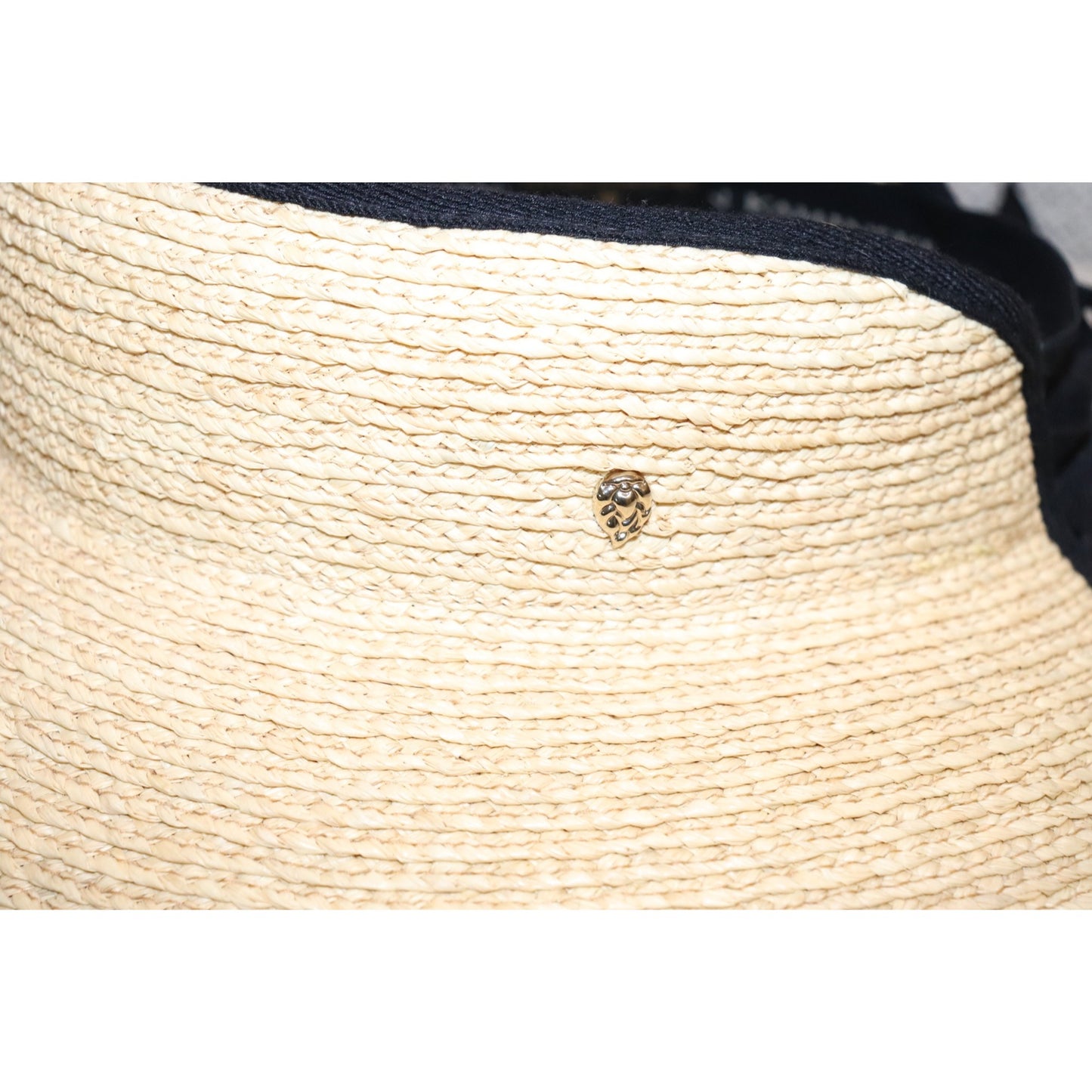 Helen Kaminski Mita Packable Raffia Visor in natural and midnight black